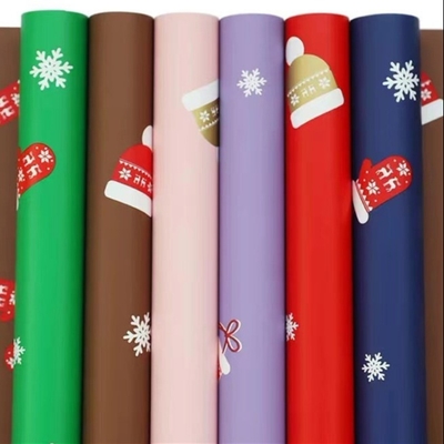 Un buen precio. Papel de embalaje de la flor del regalo de la Navidad los 58cm los x 58cm 20 hojas en bolso en línea