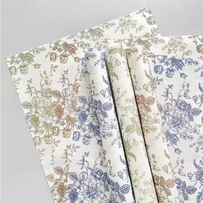 Un buen precio. 50 g de papel de envoltura florista personalizado para el empaque de flores y hojas de ramos en línea