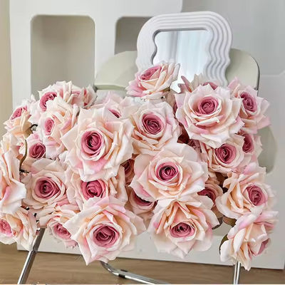 comprar Venta al por mayor de flores falsas baratas de 7 cabezas rosa de seda ramo de flores artificiales rosa para la decoración de bodas en el hogar romántico Fabricación en línea