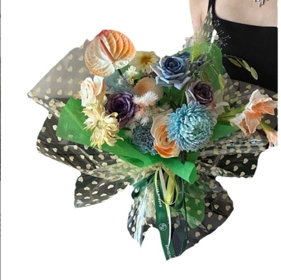 Un buen precio. Yuexin Xiancai opp papel transparente de envoltura de flores impermeable, papel de vidrio en forma de corazón papel de envoltura de flores, ramo de flores hecho a mano material diy en línea