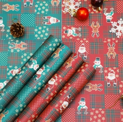 comprar Santa Claus hombre de nieve buquete de papel kraft impermeable, regalo de floristería, frutas de paz, papel de envoltura de flores, papel navideño online manufacture