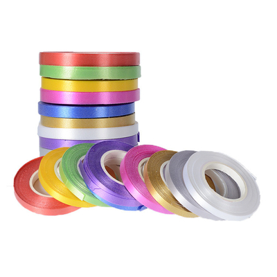 comprar El llano colorea el rollo de la cinta del papel de regalo del poliéster que empaqueta los 2.0cm online manufacture