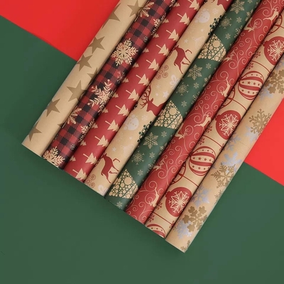 Un buen precio. Papel de regalo de Navidad 50 * 70 cm 80 g Papel Kraft Envoltura de papel de regalo en línea