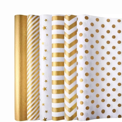 Un buen precio. Aduana a granel del papel de regalo de la hoja de oro con el accesorio reciclable del envoltorio para regalos del logotipo en línea