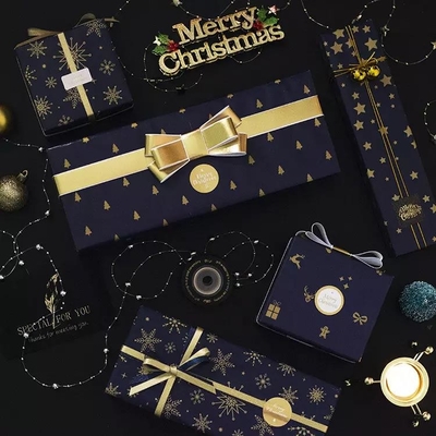 Un buen precio. Rollos de papel de regalo de Navidad de papel de regalo de rollo personalizado blanco negro clásico en línea