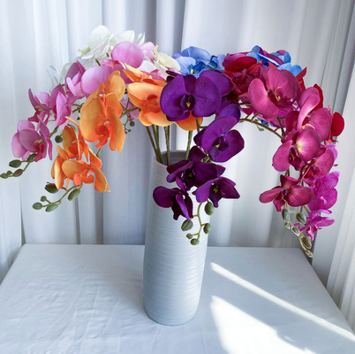 Un buen precio. Flor artificial decorativa adhesiva suave en los diversos colores para el hogar en línea