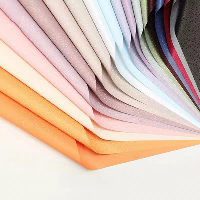 Un buen precio. Papel colorido de tejido personalizado diferente florista papel de envoltura retardante de llama en línea