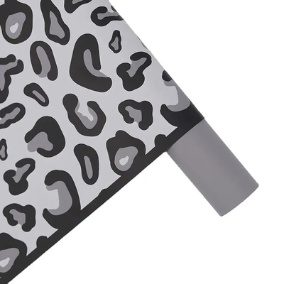 Un buen precio. Papel de embalaje para ramos florales de leopardo en línea