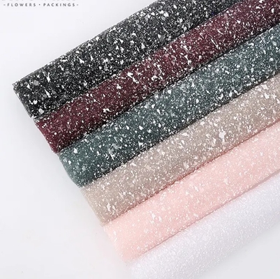 Buen precio Papel de envoltura de malla de nieve de diseño elegante en colores brillantes para empacar flores en línea