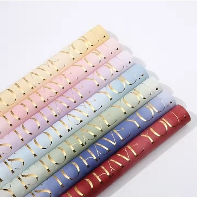Un buen precio. Papel de envoltura de regalos coreanos 58*58cm Impermeable Florista de envoltura para ramos de colores en línea