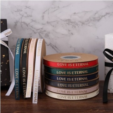 Un buen precio. 1 cm de alta tenacidad estampado en caliente cinta espiral de embalaje de flores cinta con color personalizado en línea