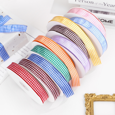 Un buen precio. Fabricante venta al por mayor cinta de cuadros escocesa de 2 cm, cinta de cuadros, cinta británica, accesorios de ropa, materiales hechos a mano en línea