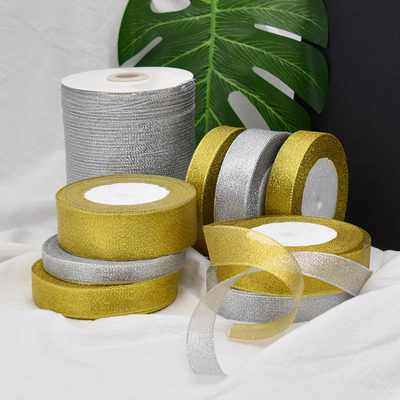 Un buen precio. cebolla de oro y plata con accesorios para decoración de la bandera, decoración navideña, cinturón de gasa de cebolla de oro y plata, bandera de cinta popular en el extranjero en línea