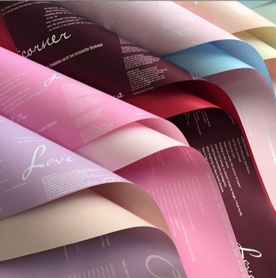 Un buen precio. Papel de envoltura de flores, papel de envoltura de floristería de arte de flores, papel Ouya de dos colores a prueba de agua, papel de flores envuelto a mano, inglés Han Fei en línea