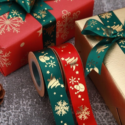 Un buen precio. Fabricante suministra cintas de poliéster impresas, cintas de copo de nieve navideño, cintas de regalo, cintas de embalaje navideño DIY en línea