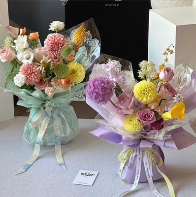 Un buen precio. Flower Love, Día del Pueblo, encaje pequeño, celofán, borde de encaje, bolso de agua, papel de flores, tienda de flores, material de embalaje de ramo popular en línea