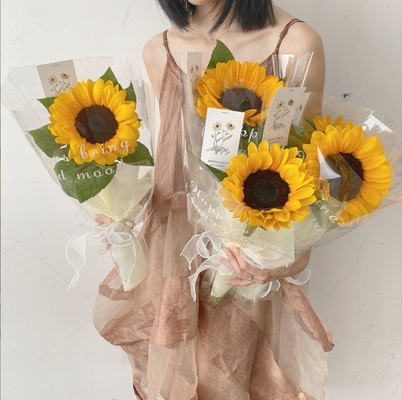 Un buen precio. Día de los Maestros Inglés transparente opp plástico impermeable celofán material de embalaje de flores de girasol papel de envoltura de ramo en línea