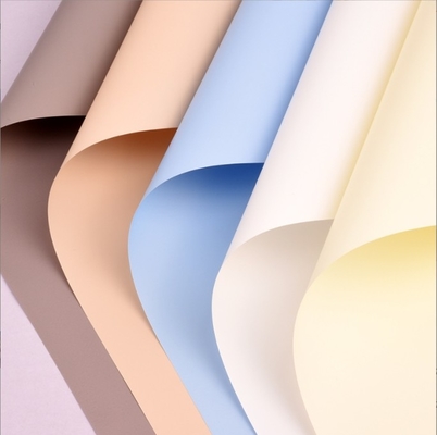 20 piezas de papel de envoltura de flores de color sólido con buena textura y firmeza, un popular papel de envoltura de ramos redondo ruso
