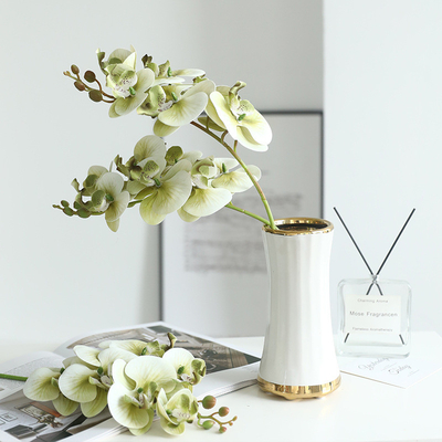 Un fresco y elegante 3D impresa película de 7 cabezas Phalaenopsis flor artificial, luz de lujo hogar sala de estar y mesa de comedor arreglo floral flor artificial.