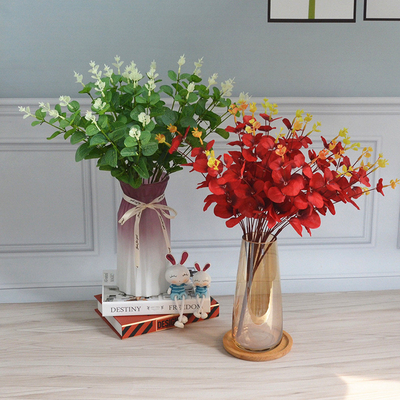 Un buen precio. Simulación de eucalipto mayorista decoración de bodas arreglo de flores al aire libre flor falsa 16 tenedor de hoja de eucalipto pastel de flores portátil con flores en línea