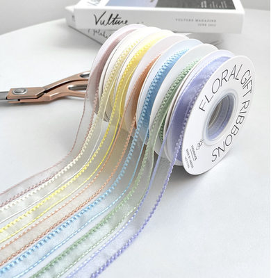 Un buen precio. Curva de onda coreana Cinturón de seda de nieve Embalaje floral Material bricolaje ramo de flores de unión de la tira decorativa avanzada en línea