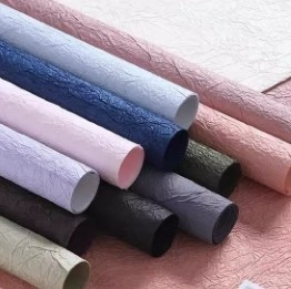 Un buen precio. Papel de embalaje para floristas y ramos con acabado de textura de piedra en línea