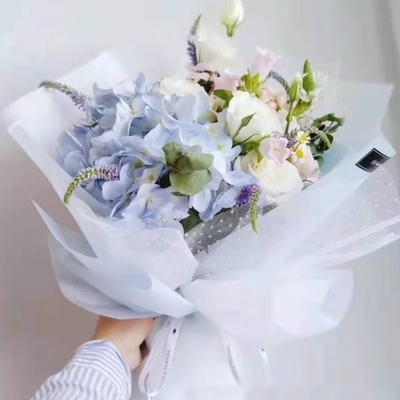 Un buen precio. Papel de envoltura de floristas para el embalaje de ramos de papel de Han Su en línea