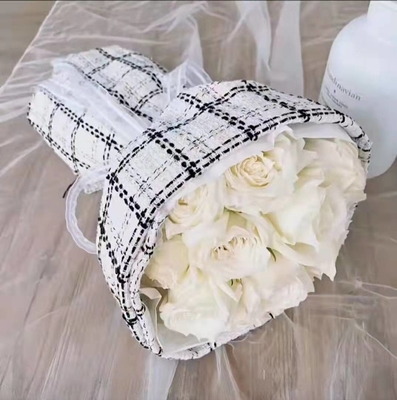 Un buen precio. Las rejillas lujosas modelan al florista de papel Packing Fabric de la tela el 150cmx50cm de embalaje del ramo de la flor en línea