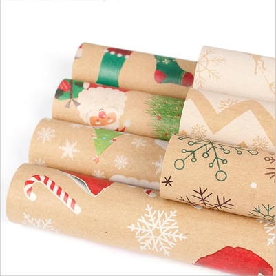 Un buen precio. el papel del papel de regalo del estilo de la Navidad 80gsm cubre los 50cm*70cm muchos nuevos diseños en línea